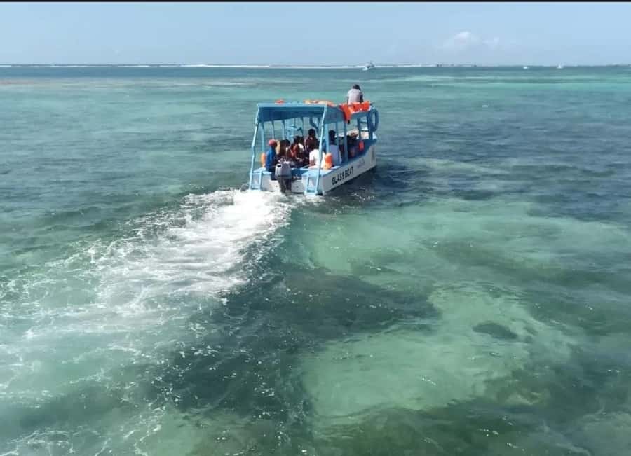 Diani Beach: Glass Boat Cruise to Robinson Island - From Diani Beach to the boat by tuk tuk