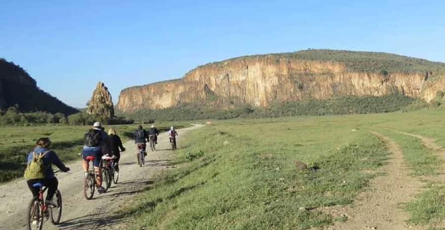 Group joining day tour to Hell's Gate and Lake Naivasha - Cycling beneath the cliffs at Hell’s Gate