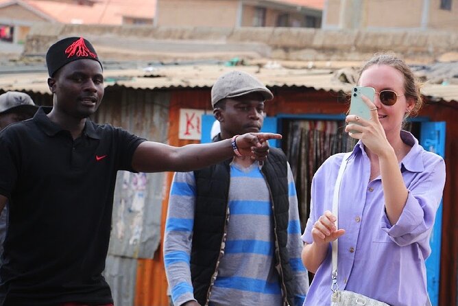Kevins Kibera Slum Tours - The landfill, train track, and main street market