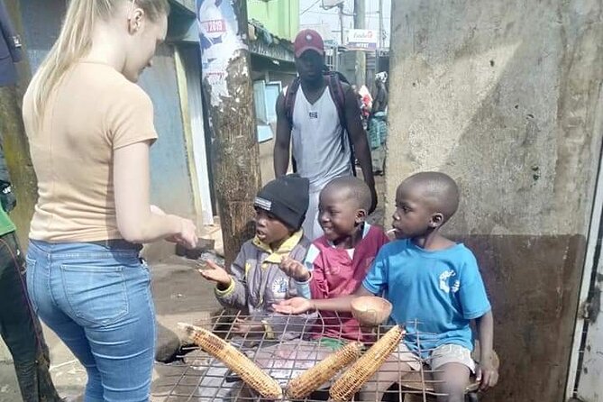 Kibera Chocolate City Tour - Walking beside the historic railway