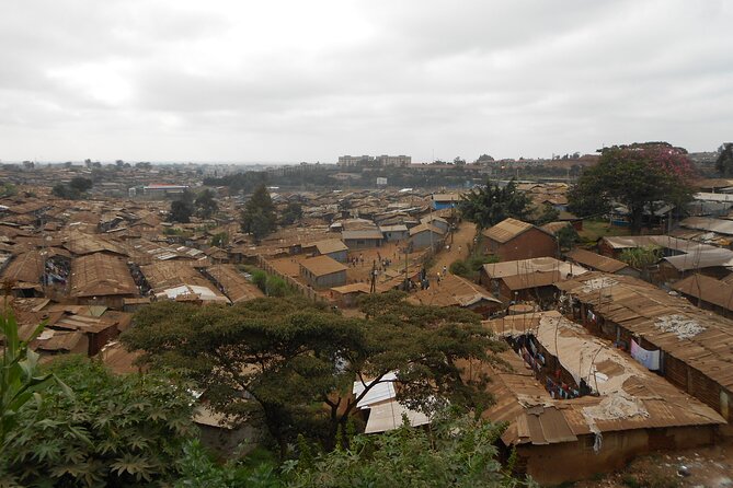 Kibera culture tour - Meeting Ochi at Prestige Plaza