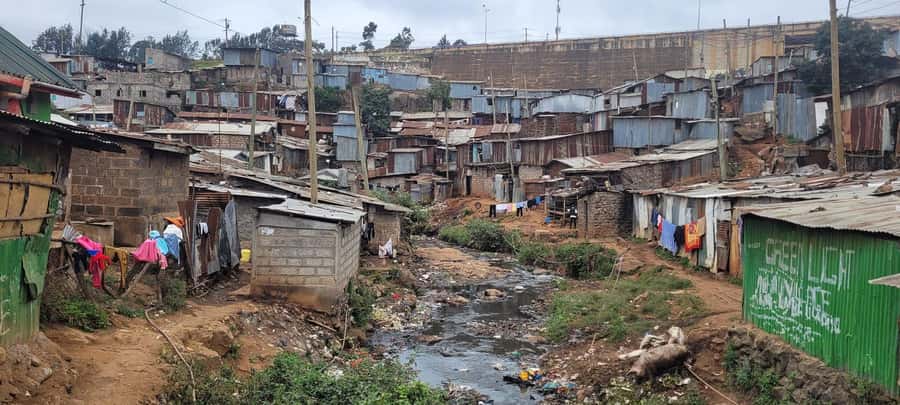 Nairobi: Chocolate City Kibera Slum Walking Tour - Walking through Chocolate City with a local guide