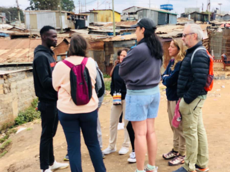 Nairobi: Kibera Slum (The Chocolate city)Guided Walking Tour - Walking through Kibera with a local guide