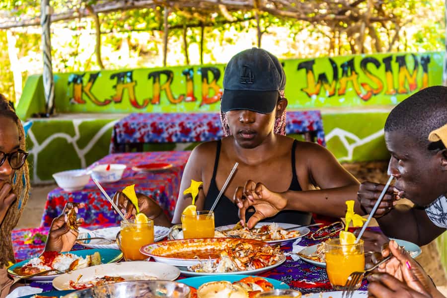 Wasini Island: Dolphin Spotting & Snorkel at Kisite Mpunguti - Walking through Wasini Island