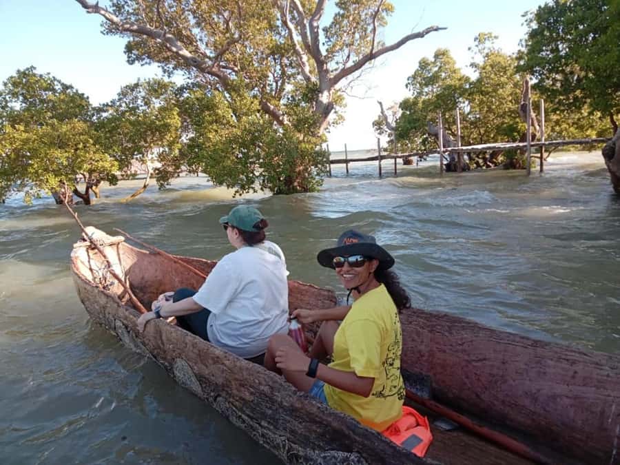 Watamu: Sunset Mangrove Canoe Tour with Coconut Drink - Entering the traditional dugout canoe